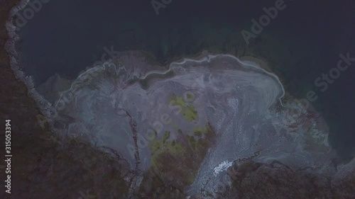 Drone shot from above Bondus Moraine Beach in Norway. Slowly flying closer to the ground. photo