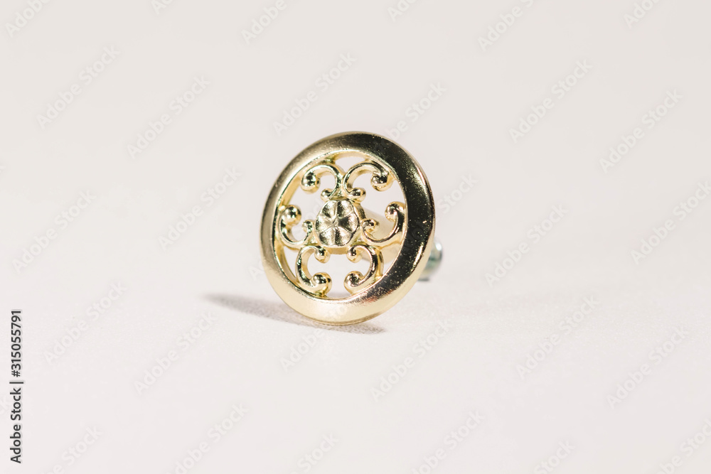 vintage shiny gold colored metal round drawer knob