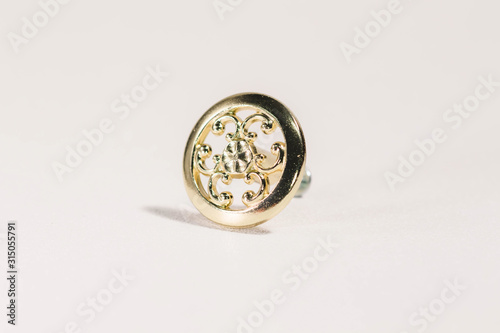 vintage shiny gold colored metal round drawer knob