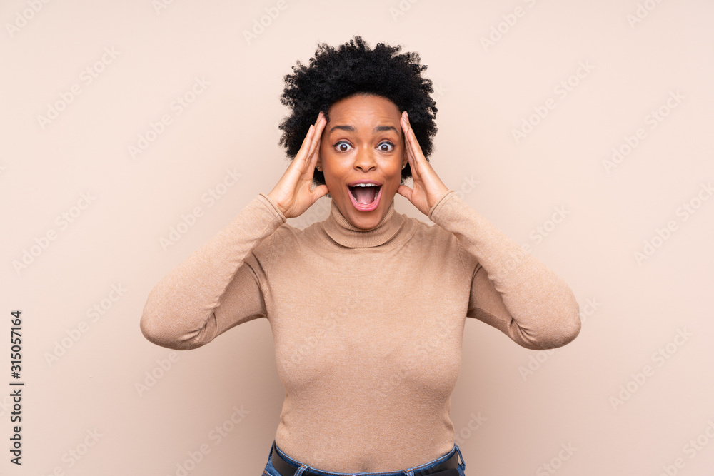 African american woman over isolated background with surprise expression African american woman over isolated background with surprise expression