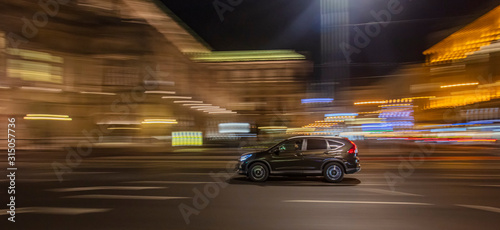 fast moving cars in the night city  © babaroga