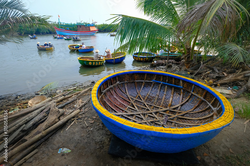 HOIAN, VIETNAM - APRIL 21, The thung chai or Basket boat floated along any of its many waterways is traditional vietnam boat in Thu Bon River Hoi An , Vietnam