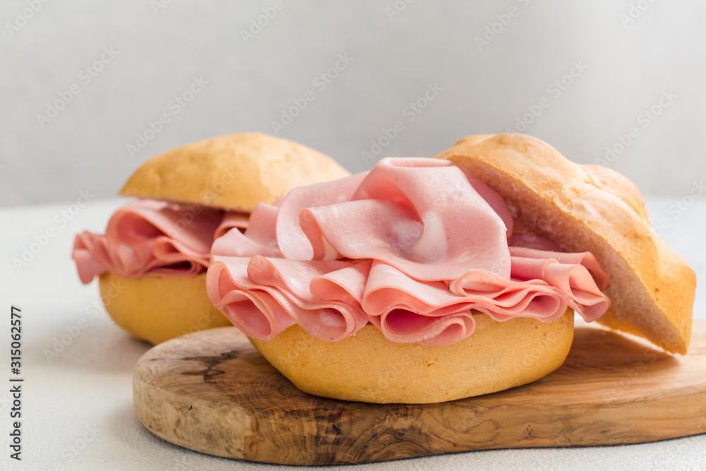 Foto de Mortadella sandwich. Mortadella Bologna a large italian sausage or luncheon with meat