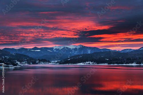 Red sky at Colibita lake  Transylvania. 