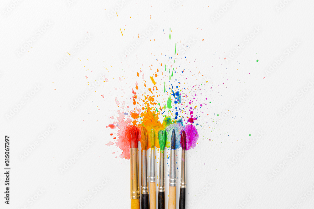 LGBTQ concept of colors made with the help of watercolor paints and brushes of azalea flowers on a sheet of paper for watercolor painting