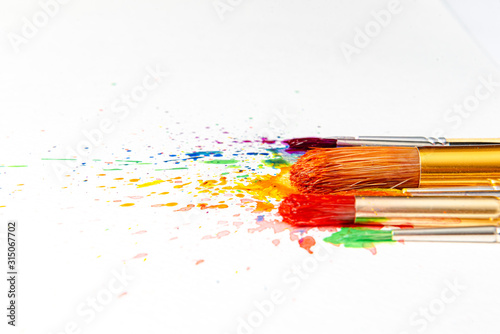 Fototapeta Naklejka Na Ścianę i Meble -  watercolor brushes on white paper