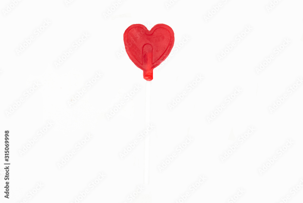 heart shaped lollipop in white background heart shaped lollipop in white background