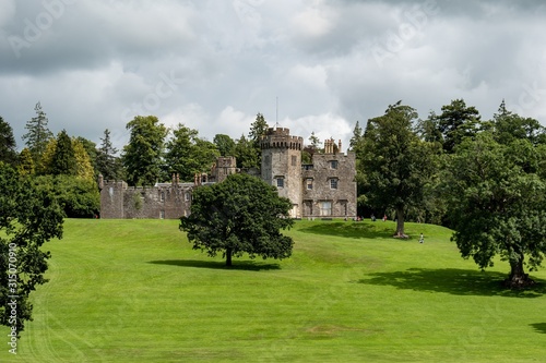 The medieval Balloch Castle in Scotland build on a hill in an early 19th century during the nice summer day