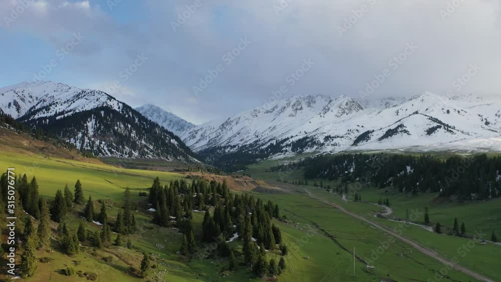 Waterfall Kok-Bel in the valley of Jyrgalan Tien-Shan Kyrgyzstan