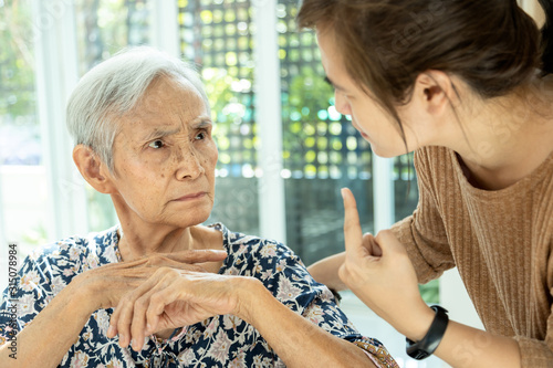 Asian senior woman is confused because she can not remember the face of their family or forget her daughter,memory loss in elderly people,female patients with cognitive impairment,alzheimer,dementia