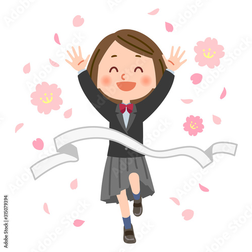 ゴールテープを切る学生