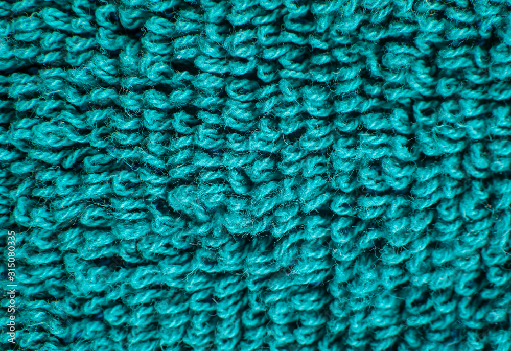 Green mint woolen fabric texture closeup Green mint woolen fabric texture closeup