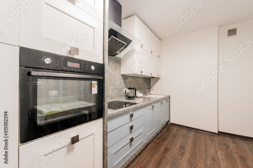 Russia, Moscow- September 07, 2019: interior room apartment modern bright cozy atmosphere. general cleaning, home decoration, preparation of house for sale. kitchen, dining area