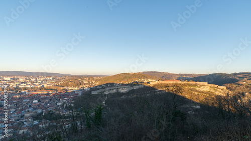 Aerial view of French town Besançon and Besançon castle at dusk