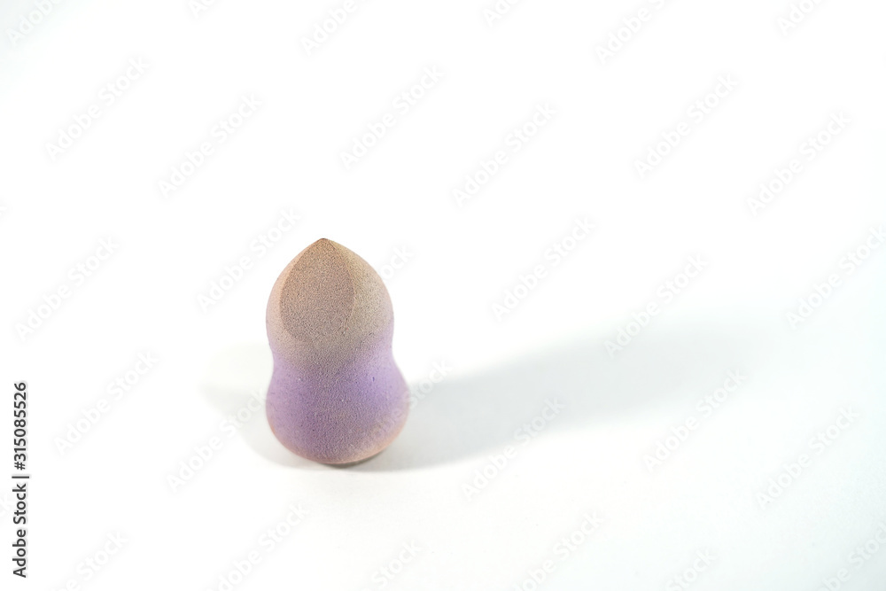 Dirty foundation sponge used isolation on white background. Dirty foundation sponge used isolation on white background.