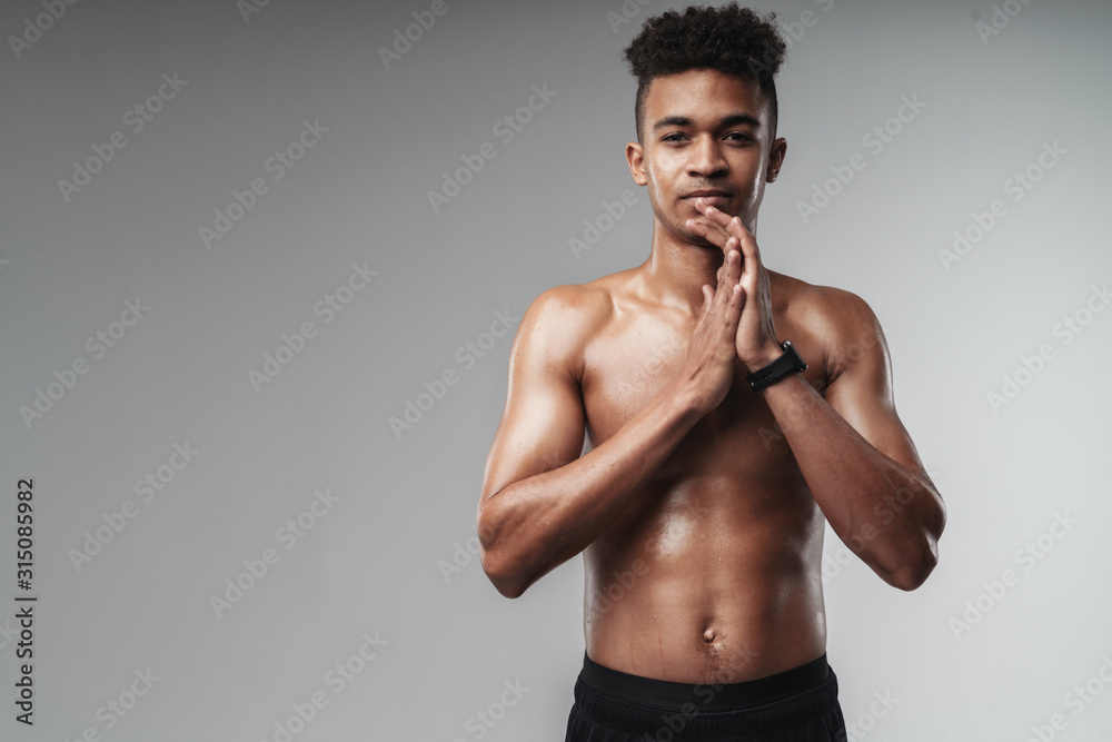 Photo of african american man looking at camera while working out Photo of african american man looking at camera while working out