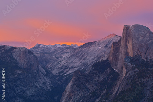 Landscape of Half Dome and the Sierra Nevada Mountains at twilight from Glacier Point, Yosemite National Park, California, USA