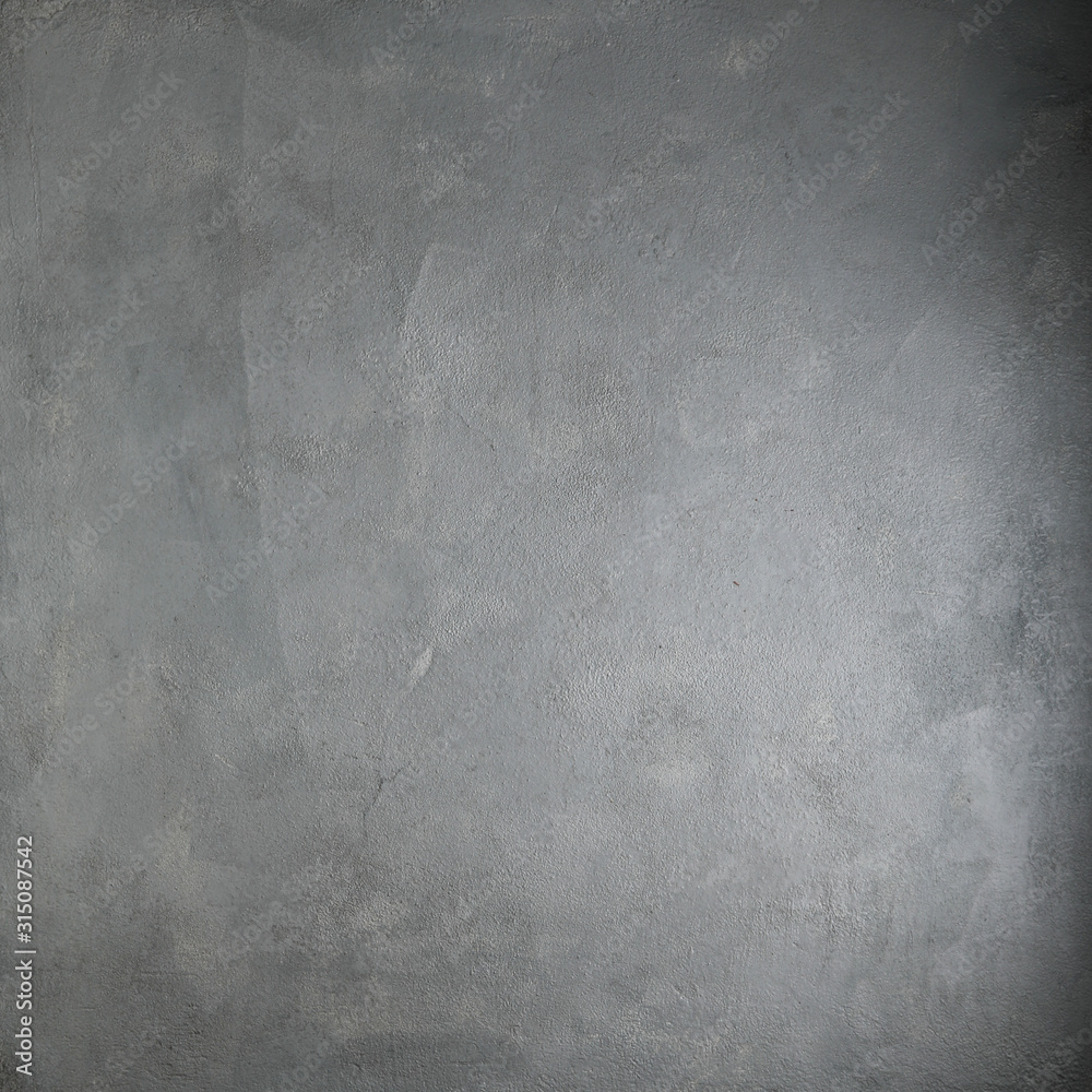 Naklejka premium Gray concrete texture or background. With place for text and image.