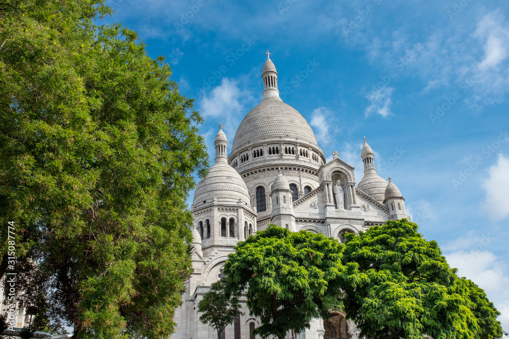 Landscape with a view of the white Basilica sacré coeur in Paris in France