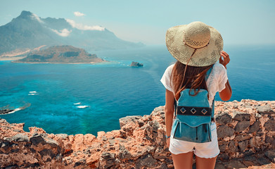 Tourism, travel, vacation on the rocky sea.