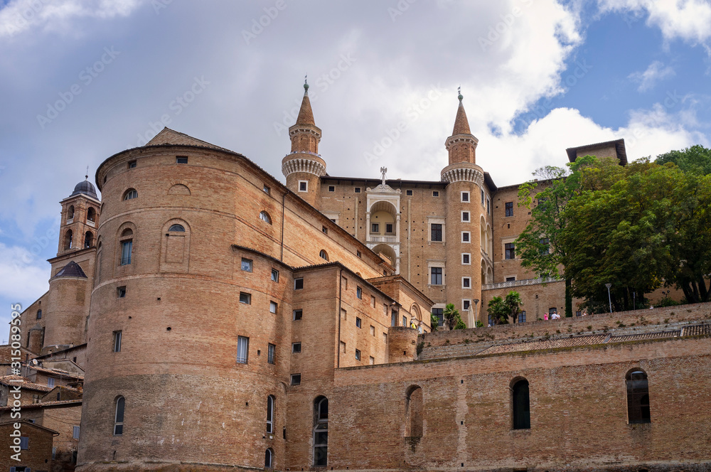 The ancient walls and towers of the medieval Ducale Palace of Urbino (Marche Region, Italy).