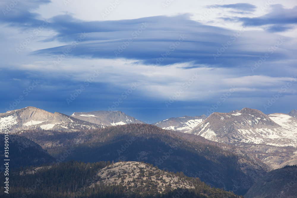 Landscape of the Sierra Nevada Mountains with beautiful clouds from Glacier Point, Yosemite National Park, California USA