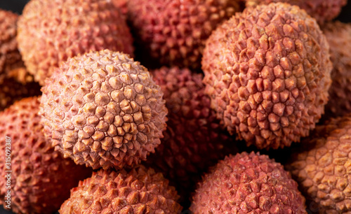 Lychee (Litchi chinensis) fruit close-up, lychee background.