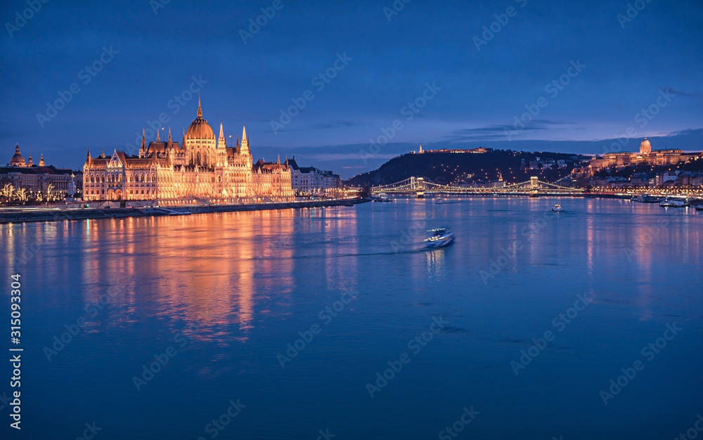 The famous Hungarian Parliament in Budapest in dusk
