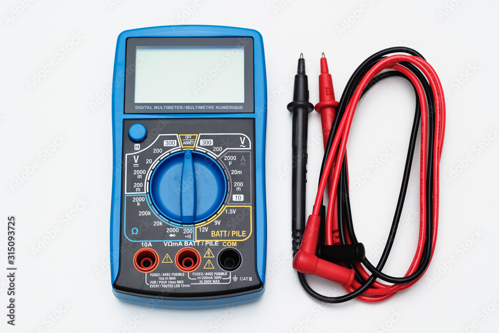 Electrical multimeter on white. Top down view. Electrical multimeter on white. Top down view.