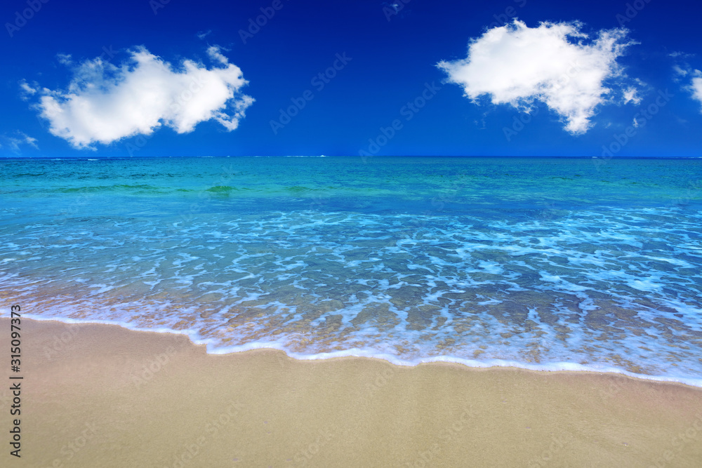 Caribbean sea and blue clouds sky. Travel background.