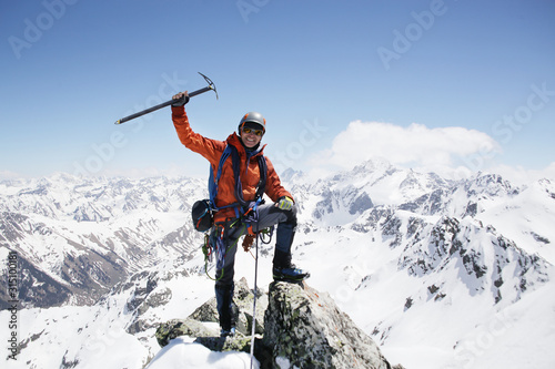 alpinism in the snowy mountains photo