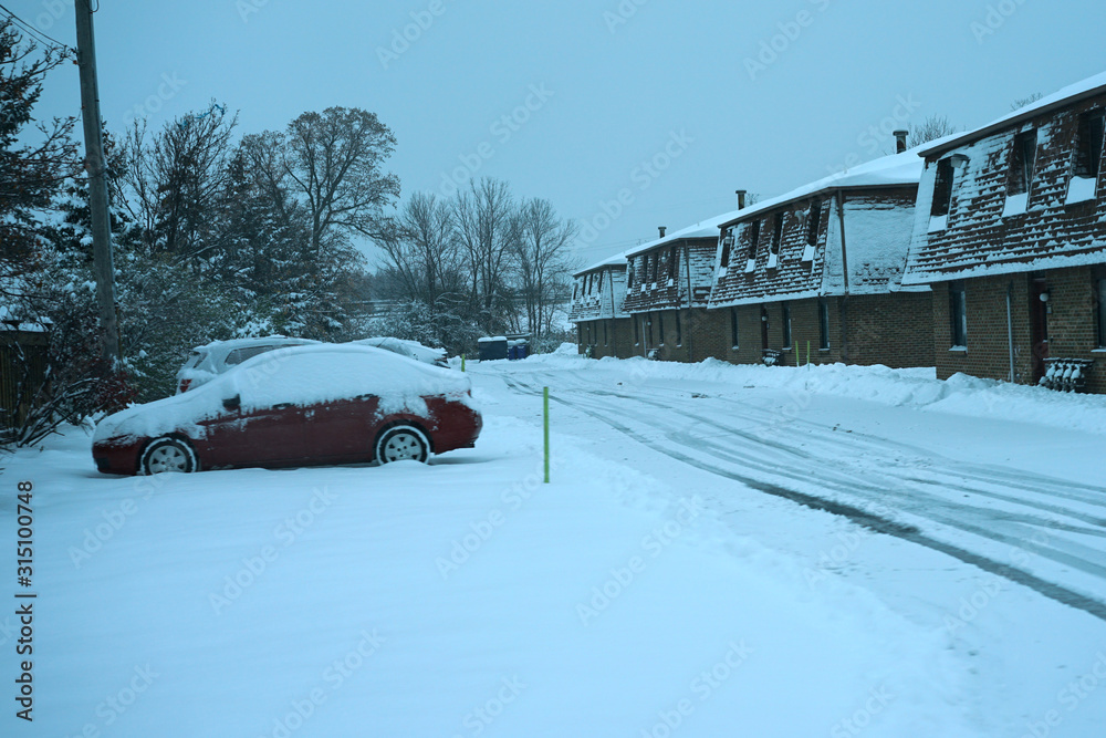 Snowy street with snow covered cars. Snowy street with snow covered cars.