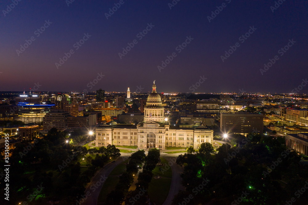 Aerial photo of an iconic texas landmark, the texas state capitol building at night Aerial photo of an iconic texas landmark, the texas state capitol building at night