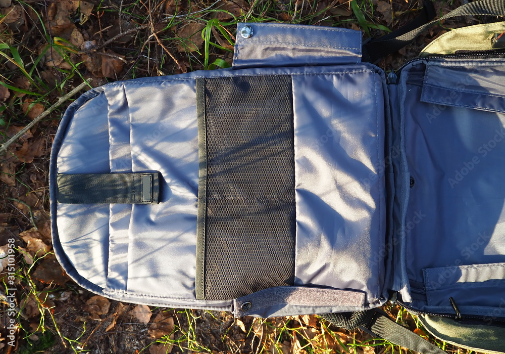 Fototapeta premium A modern backpack, the internal content and design.