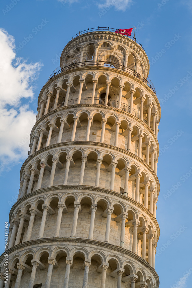 Close photo of Pisa tower upper part. Most popular travel landmark at Pisa, Italy.