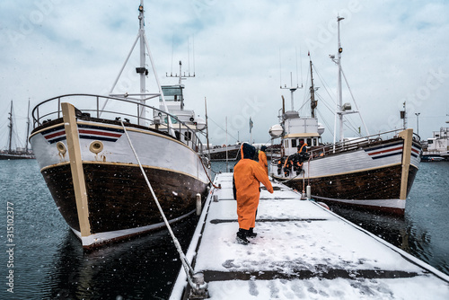 Valokuvatapetti professional fishermen are preparating for fishing