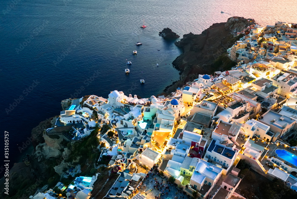 oia santorini evening or night central place blue domes in greece beautiful cyclades island greek resort