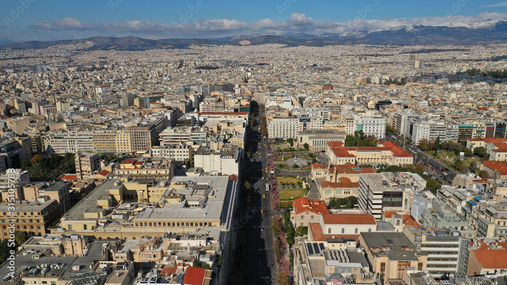 Aerial drone photo of Athens urban cityscape featuring famous landmark neoclassic buildings, Attica, Greece