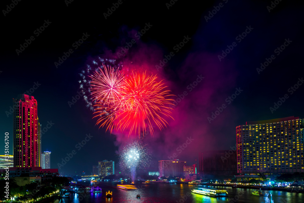 Beautiful firework display for celebration happy new year and merry christmas with Twilight night and firework lighting in bangkok cityscape background, Thailand. Beautiful firework display for celebration happy new year and merry christmas with Twilight night and firework lighting in bangkok cityscape background, Thailand.