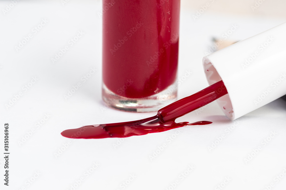 red nail polish and manicure brush with varnish red nail polish and manicure brush with varnish