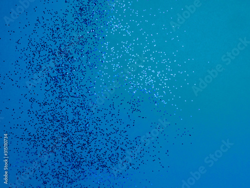blue glitter shiny classic blue background, trendy color of 2020, copy space