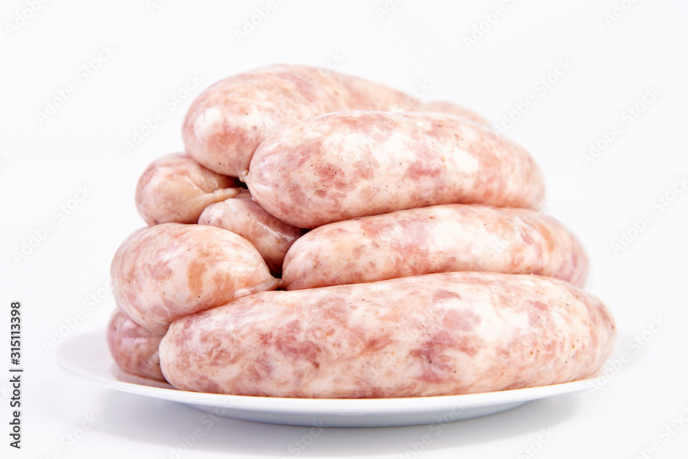Raw Sausages, Oktoberfest Sausages close-up, isolated on white background. Raw Sausages, Oktoberfest Sausages close-up, isolated on white background.