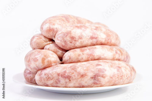 Raw Sausages, Oktoberfest Sausages close-up, isolated on white background.