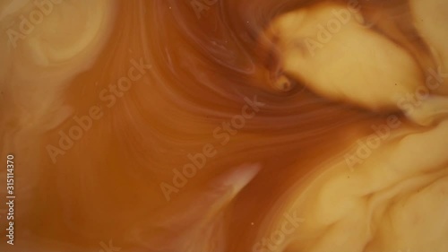hot coffee and pouring milk cream mixing texture background for drinking concept