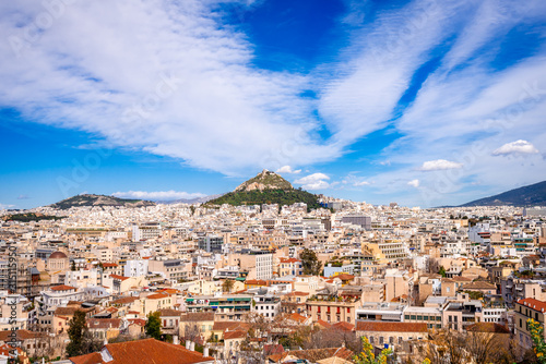 The Athens' skyline, in Greece, with the Lycabettus Mount. Photo taken from Anafiotika neighborhood, in northerneast side of the Acropolis hill. photo