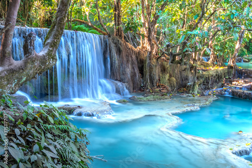 Kuang si waterfall, beautiful turquoise waterfalll in Luang Prabang, Lao.  Listed as UNESCO heritage site