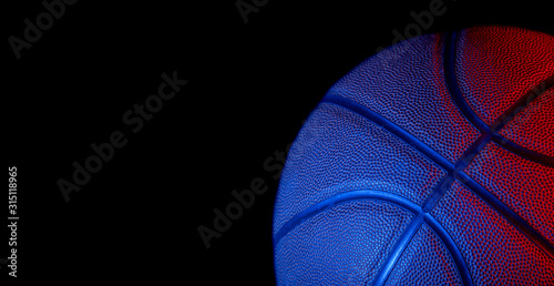 Closeup detail of basketball ball texture background. Blue neon banner art concept. Minimalism, place for text © Augustas Cetkauskas