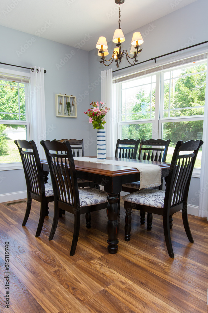Fototapeta premium dining room with table and chairs