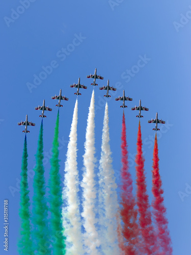 Italian Air Force aerobatic demonstration team Frecce Tricolori flying display during air show Falcon Wings 2019 at Siauliai Air Base