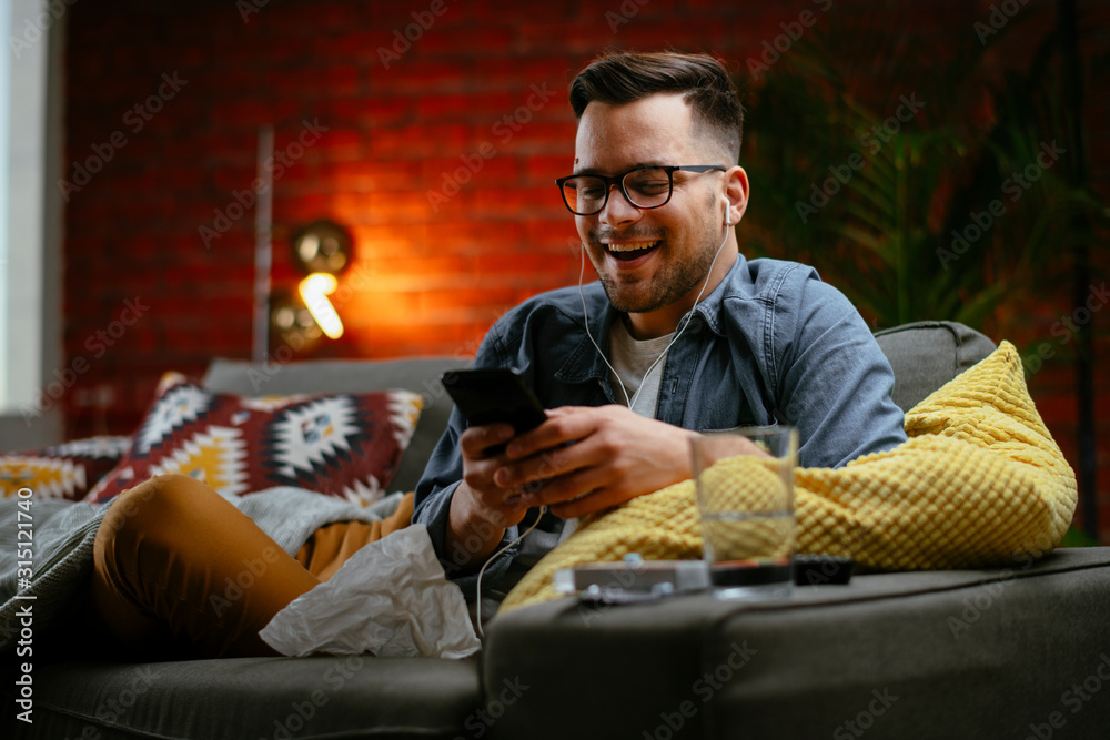Young man having a video call. Handsome man talking on his smartphone.